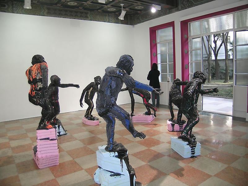 apes on blue and pink pedestals