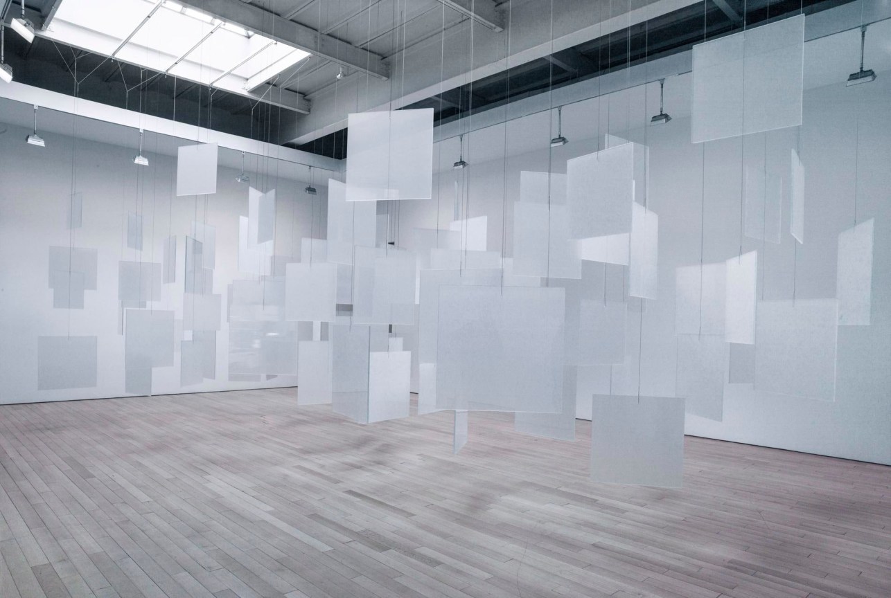 85 Opaque Glass Panels Hanging from Aircraft Cable