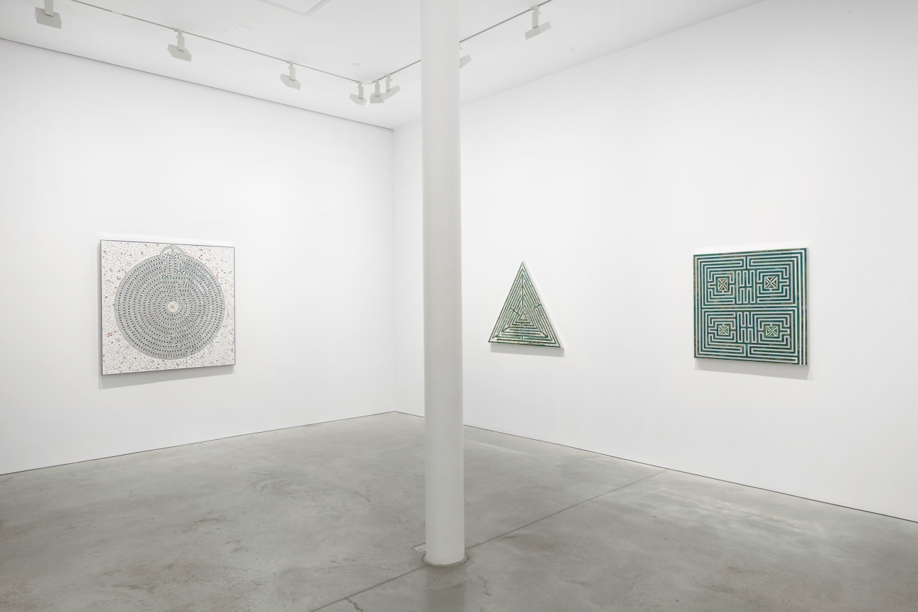 view of three glass artworks