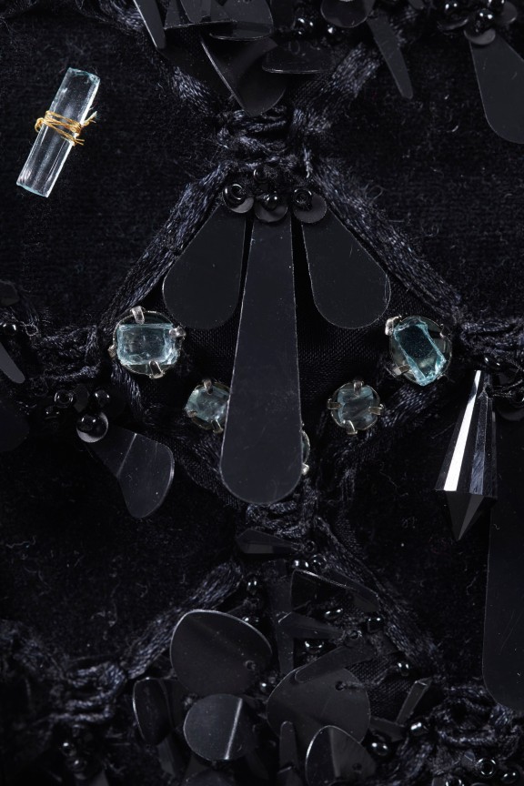 close up of black dress's beading