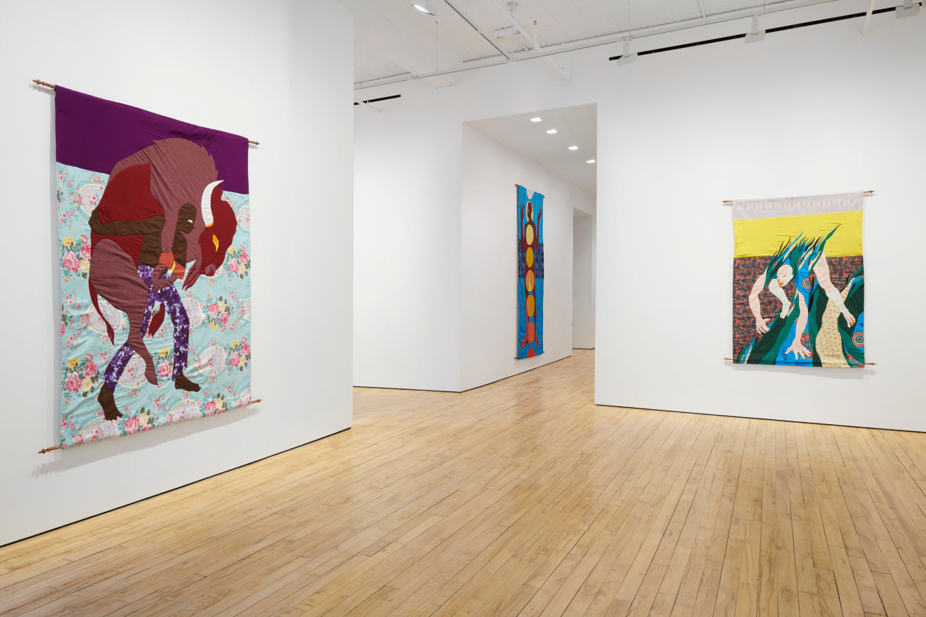 view of three tapestries