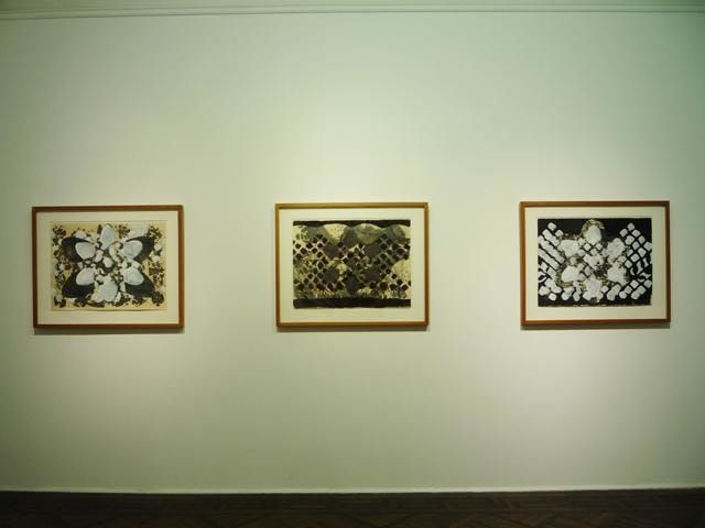 Installation view of three artworks