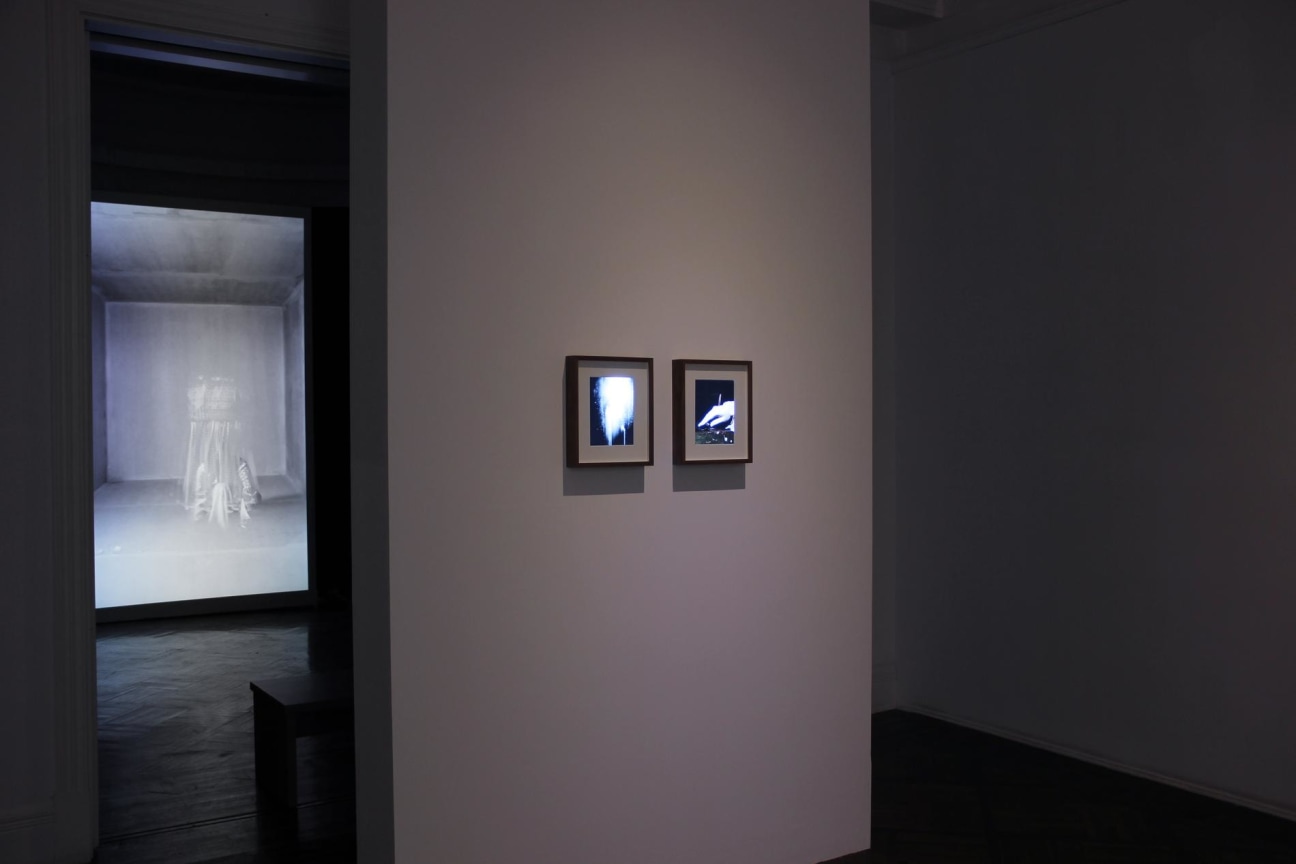 small video boxes hanging from the wall