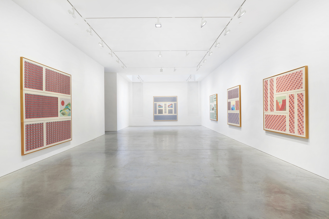 long gallery full of embroidered works