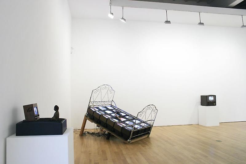 Installation view of three works