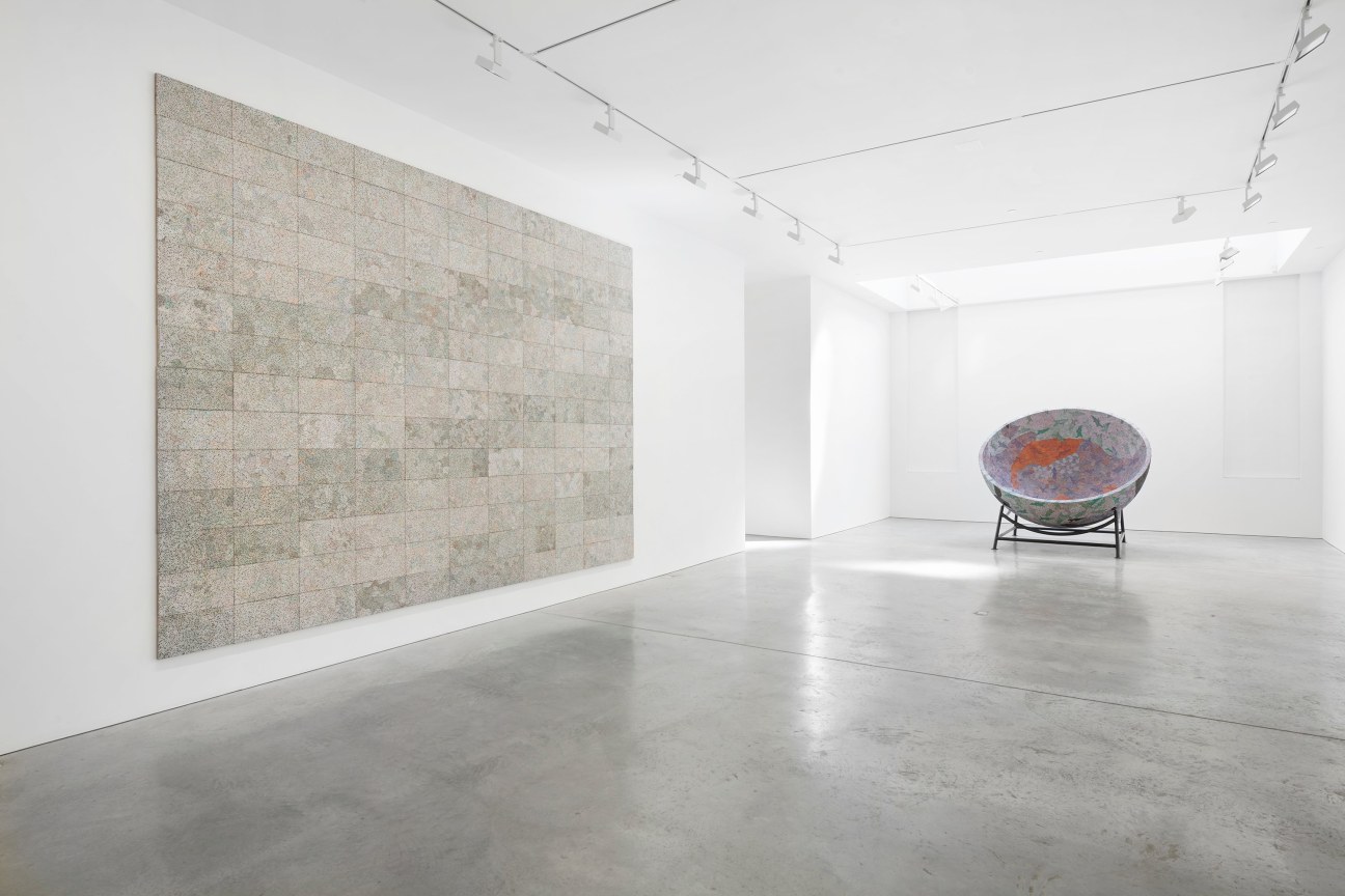 two large artworks in a long gallery