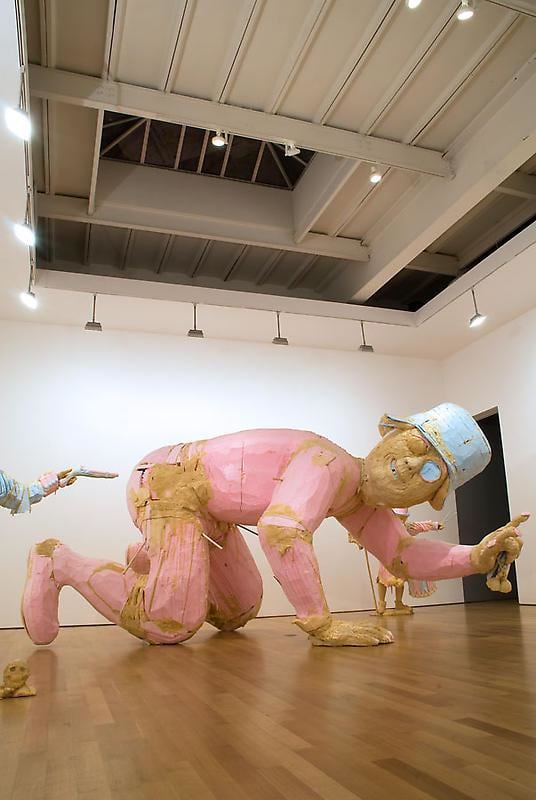 giant statue kneeling