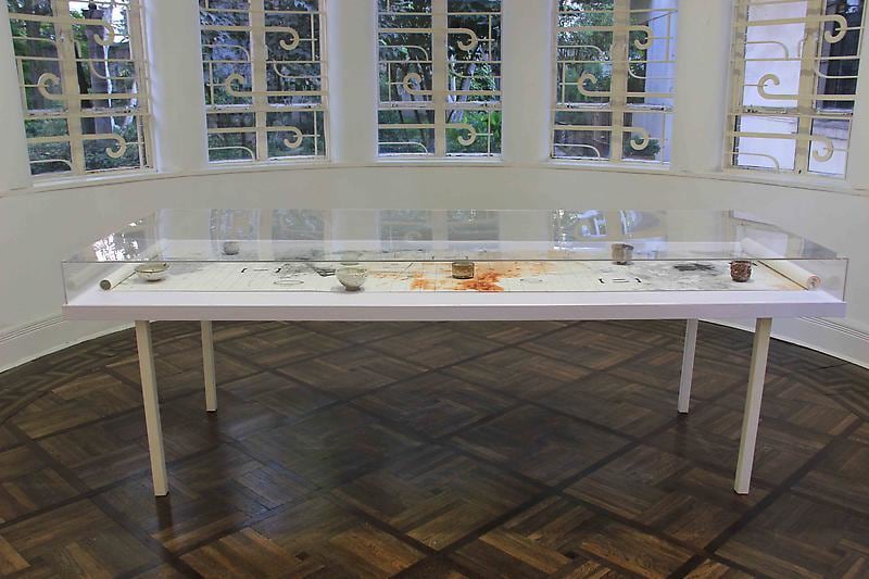 installation view of glass case