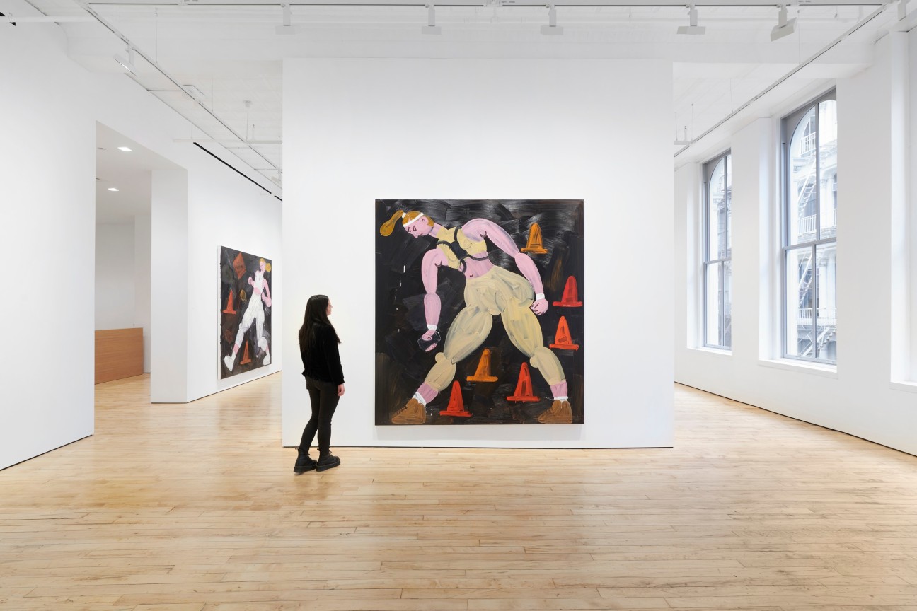 person looking at a painting