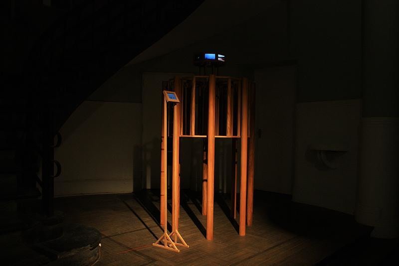 orange contraption in the dark