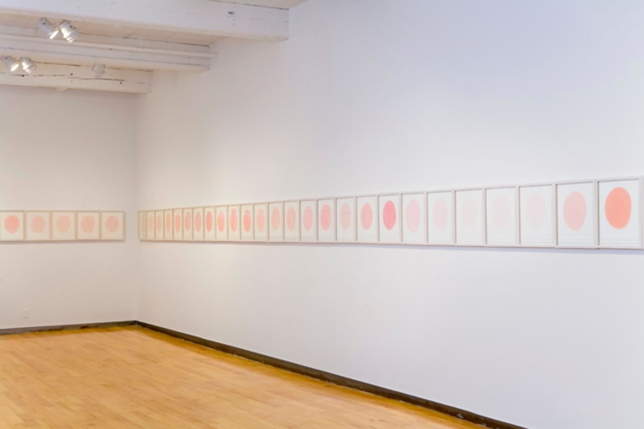 light pink pastel circles on paper all stacked in a row