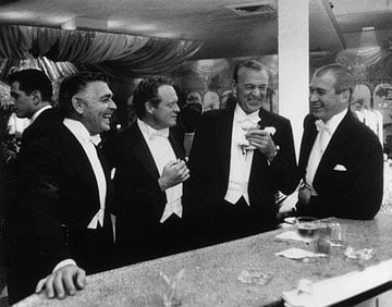 Slim Aarons, Kings of Hollywood: Clark Gable, Van Heflin, Gary Cooper, and James Stewart at Romanoff’s in Beverly Hills, 1957