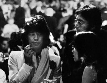 Ron Galella, Mick Jagger, John Lennon, and May Pang at the AFI Salute to James Cagney at the Century Plaza Hotel, California, 1974