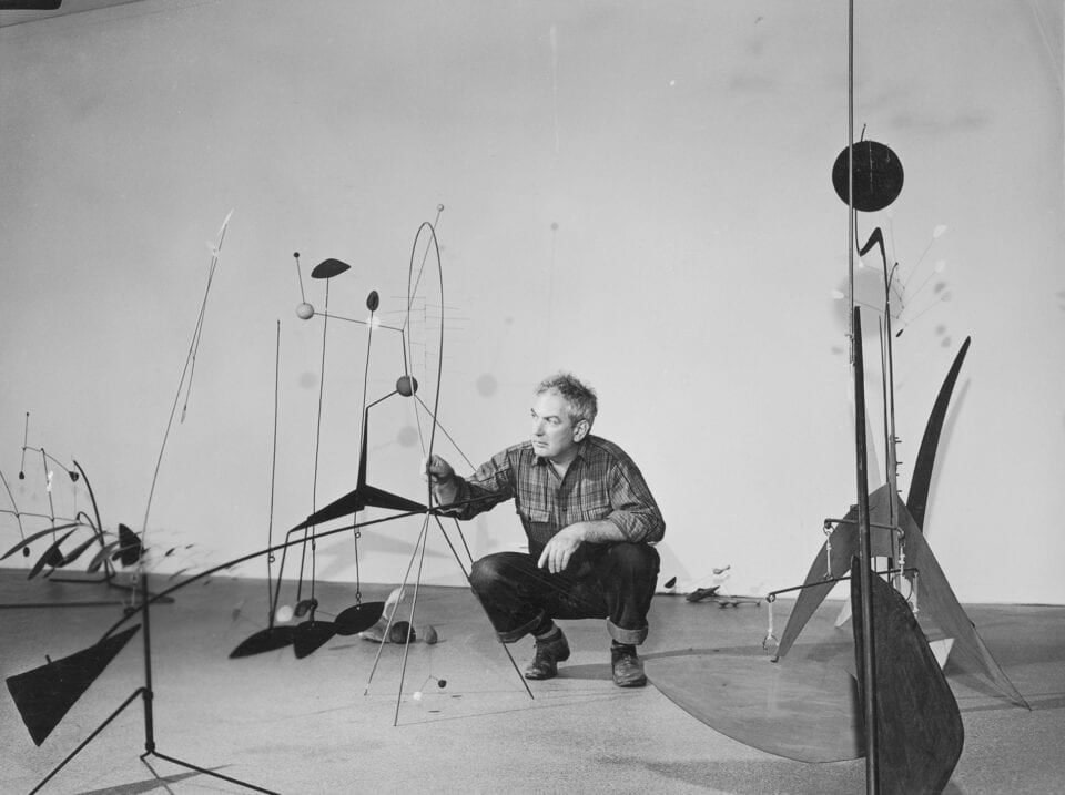 Archival publicity photograph of Calder during the installation of &ldquo;Alexander Calder&rdquo;