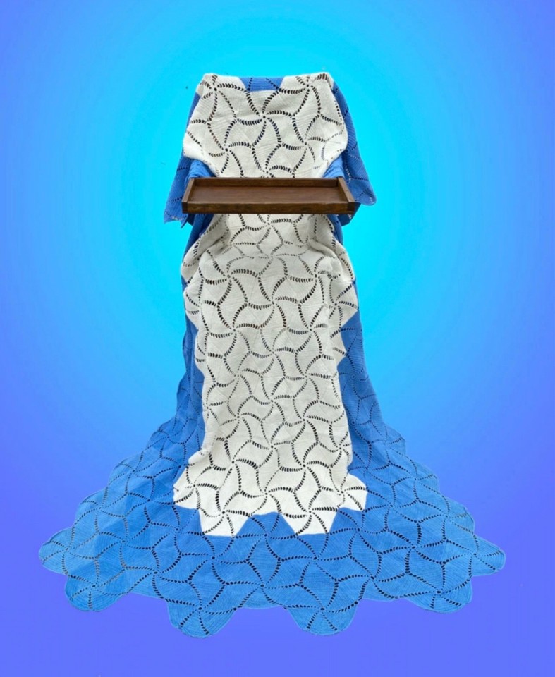 Xenobia Bailey, &ldquo;Straight Out of this World&rdquo; (2020), still life photograph, found objects, crochet afghan draped over a vintage wooden chair