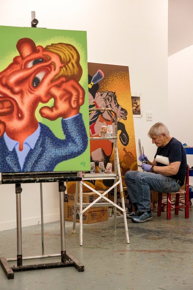 Peter Saul at work in his studio in Germantown, New York. By Tim Davis.