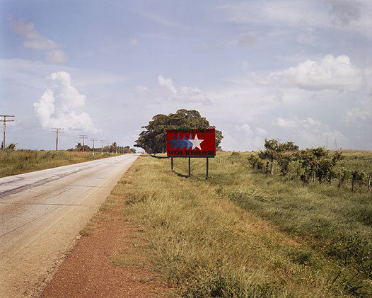 Volveran sign on the highway between Ciego de Ávila and Camagüey, 2004