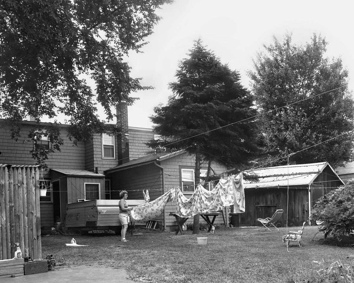 Woman Hanging Laundry, 1983-84