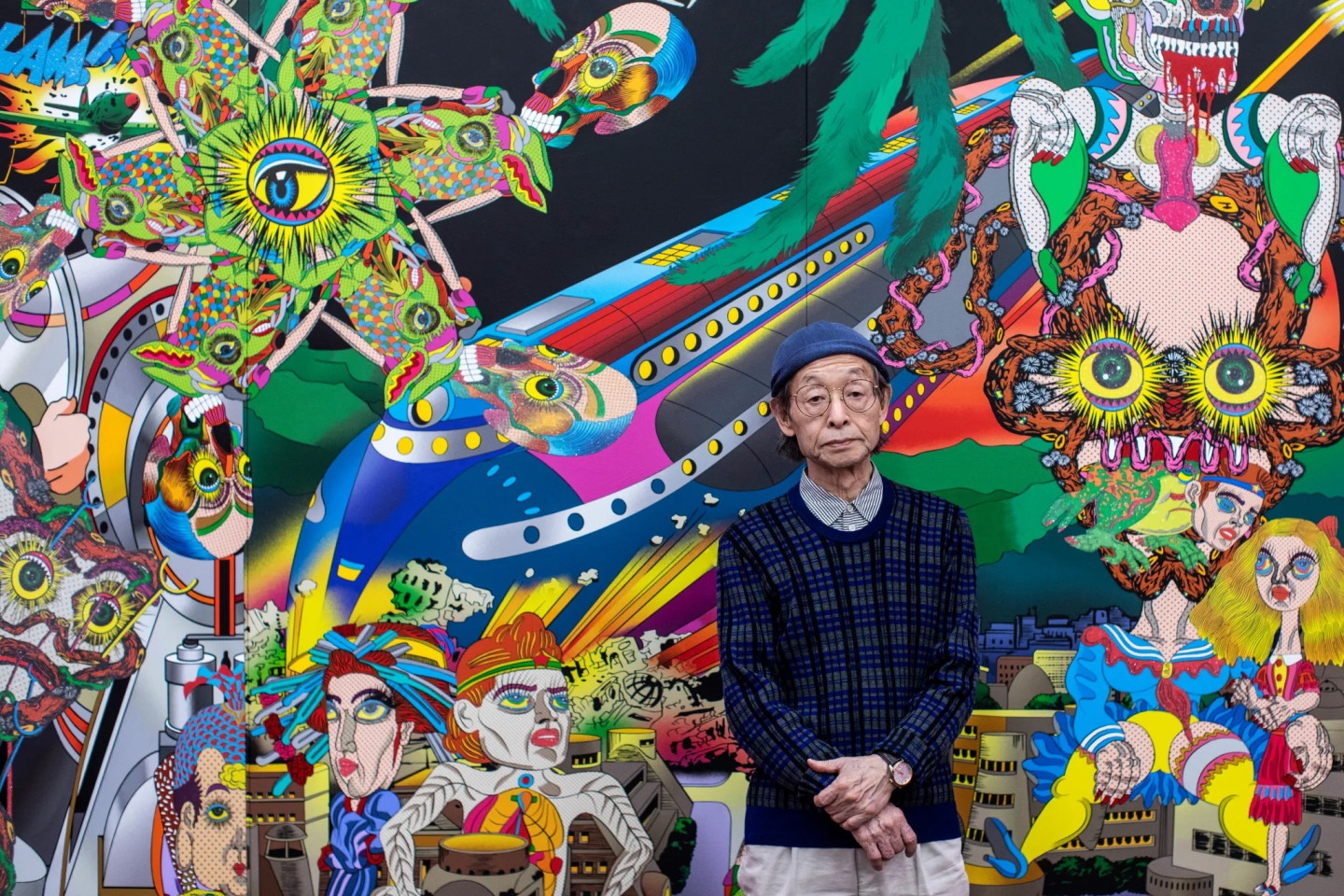 Keiichi Tanaami poses before his work at Kunstmuseum Luzern, Switzerland, April 5, 2019.&nbsp;Photo: Alexandra Wey/Keystone/AP Images.