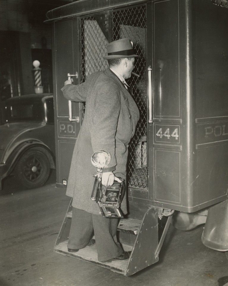 Weegee (Hungarian, 1899 - 1968), Self-Portrait in Paddy Wagon, c.1936