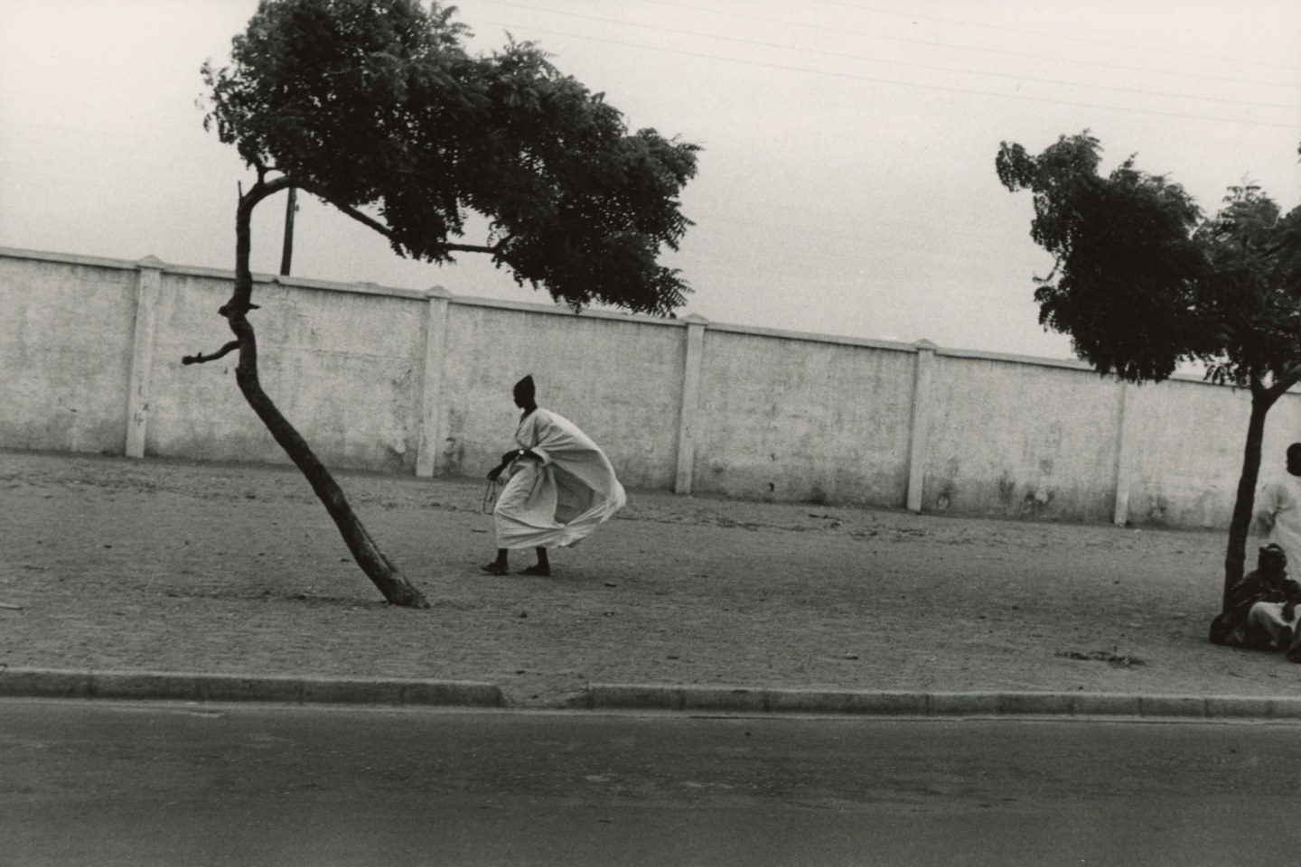 Ming Smith (American, b. 1947), Dakar Roadside with Figure, 1972