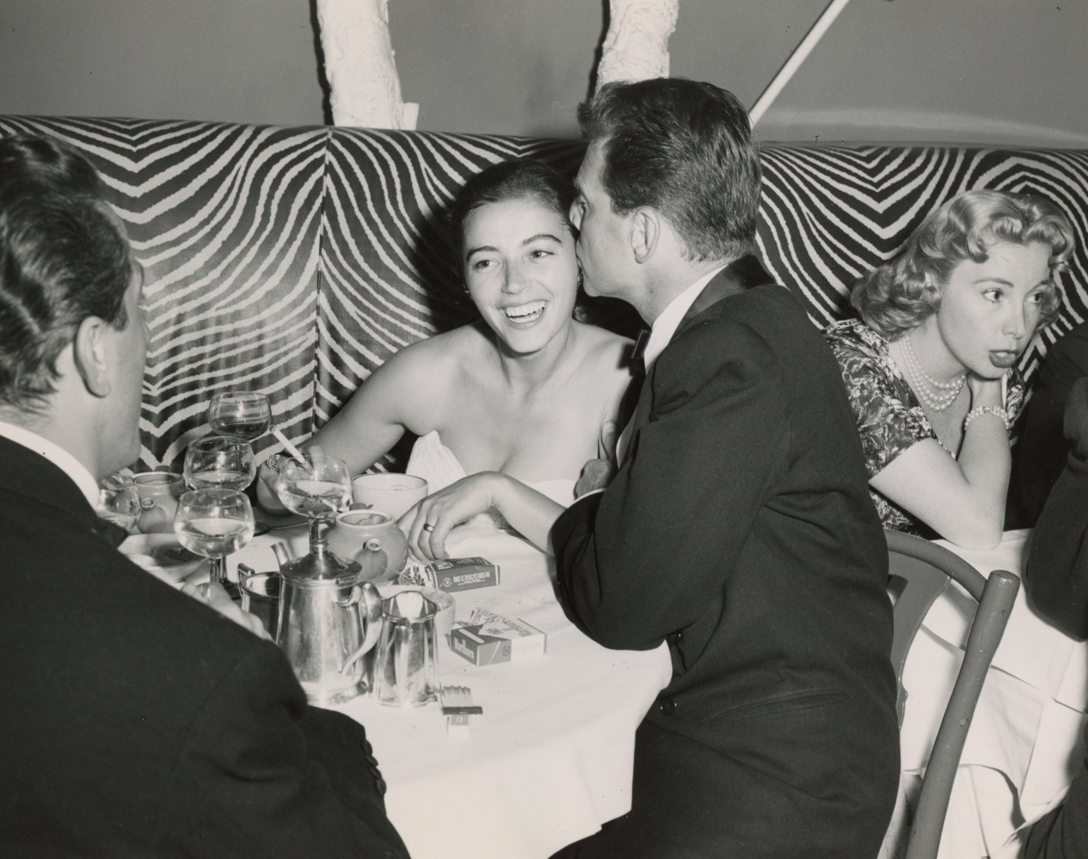 ANONYMOUS PRESS PHOTO OF JEAN-PIERRE AUMONT, MARISA PAVAN AND JOYCE RANDOLPH AT EL MOROCCO NIGHT CLUB, C. 1950