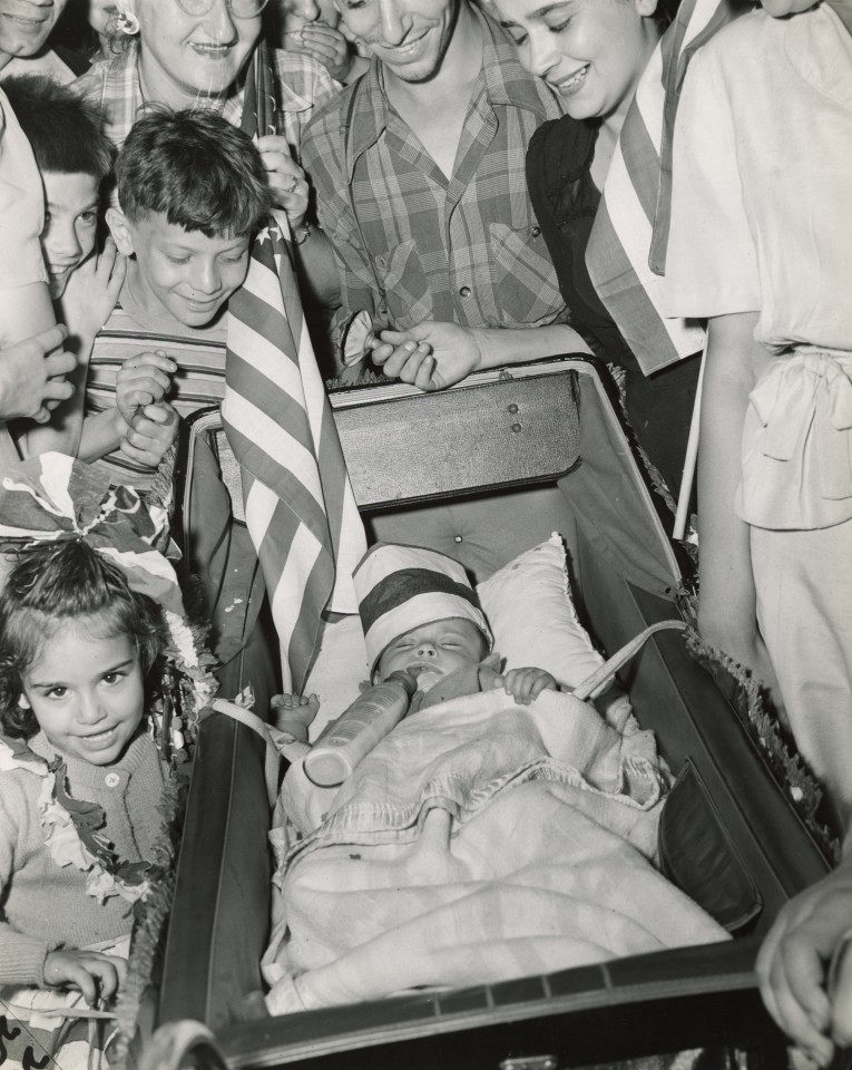 Weegee (Hungarian, 1899 - 1968), Little Bobby De Marco, age 7 months, at 2nd Ave. and 9th St., East Side, Tuesday night, after 7 PM