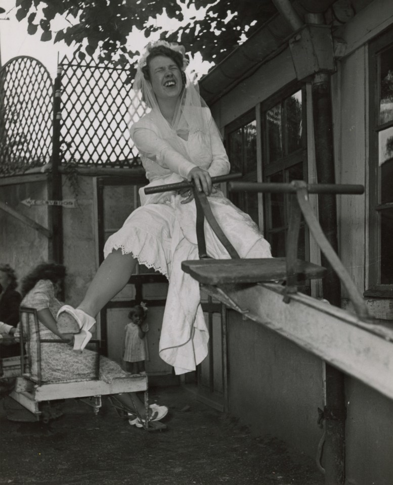 Robert Doisneau (French, 1912 &ndash; 1994), Bride on See-Saw at Suburban Wedding, c. 1953