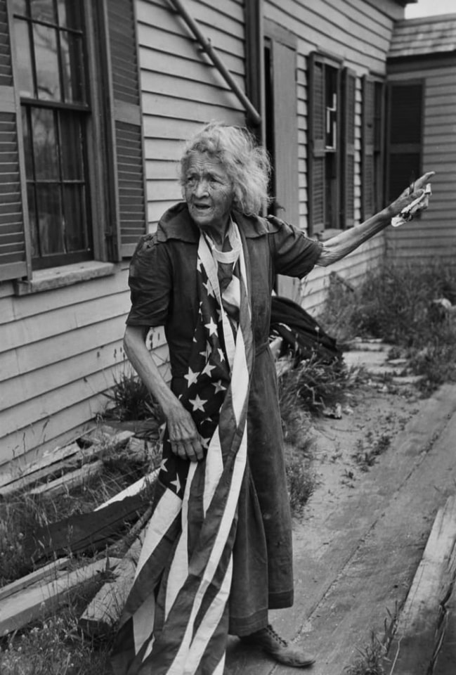 Henri Cartier-Bresson (French, 1908 &ndash; 2004), Woman with American Flag, Independence Day, Cape Cod, MA, 1947