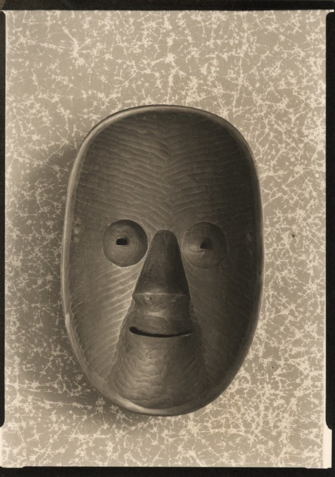 ELIE NADELMAN, PHOTOGRAPH OF A CARVED MASK, C. 1920