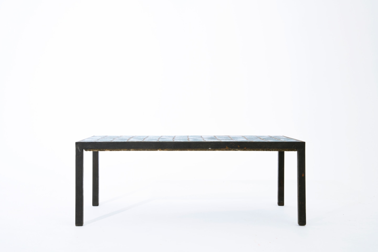 French 1960's blue ceramic coffee table straight eye-level view
