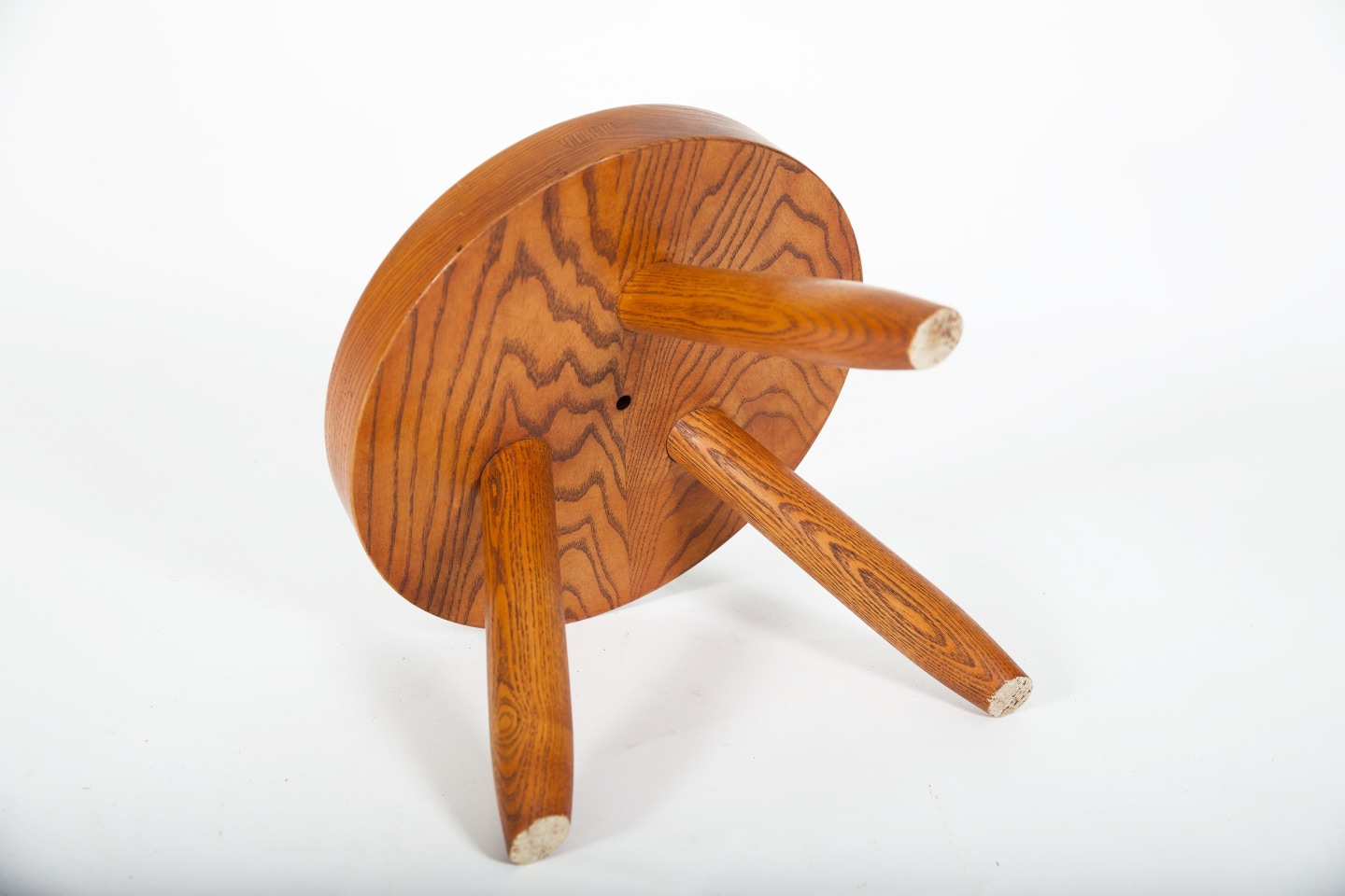 Charlotte Perriand's low stool, view of underneath the stool