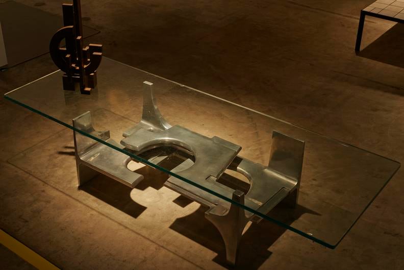 Magen H Gallery's booth at Design Miami/Basel, install view showing Marino di Teana &quot;Libert&eacute;&quot; sculpture with G&eacute;rard Mannoni's sculptural coffee table