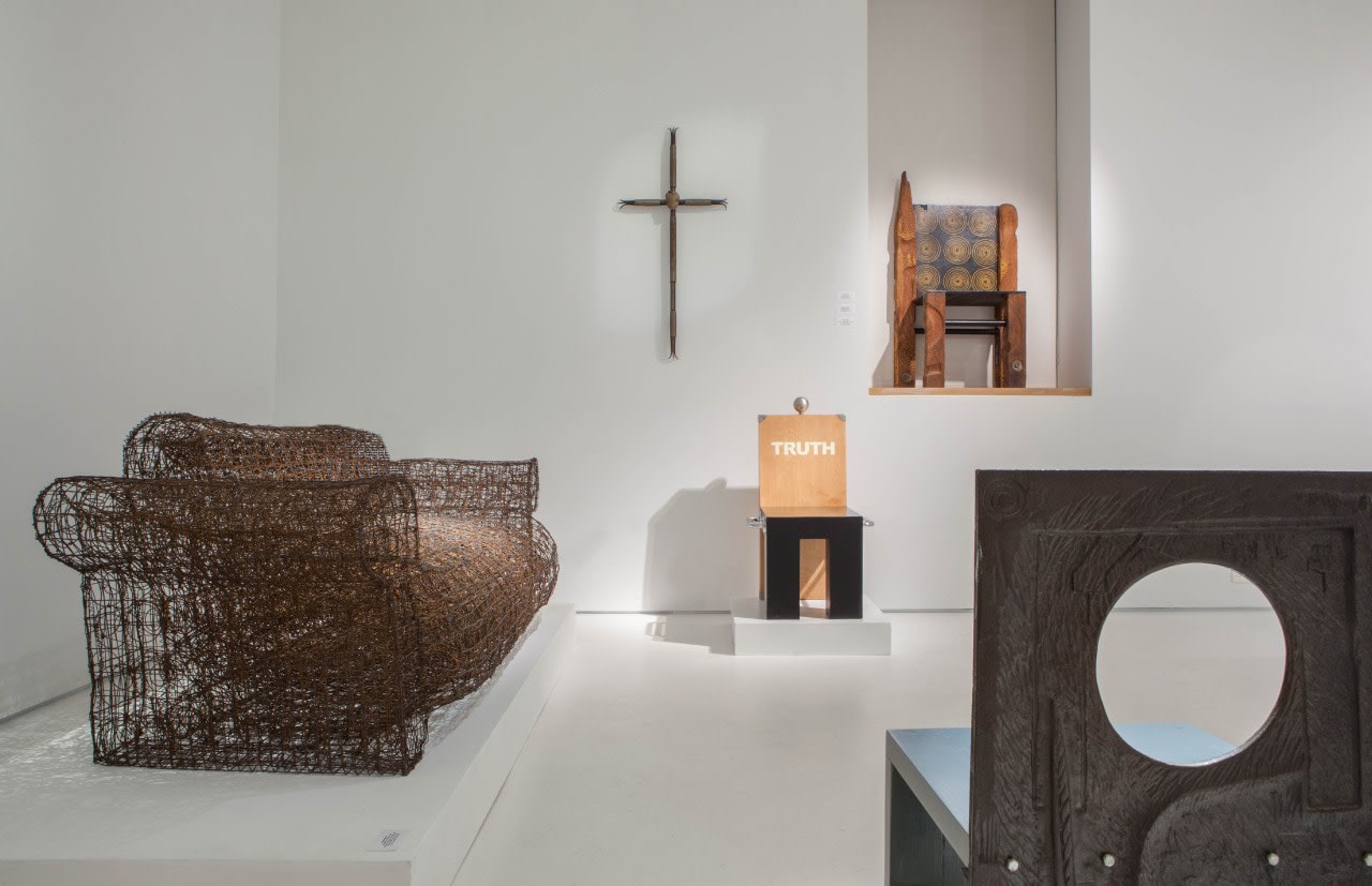 Art et Industrie exhibition installation view: Pieces from left to right are Forrest Myers' wire couch, Norman Campbell's cross, Dan Friedman's Truth chair, and Laura Drake Johnson's &quot;Soul Badge&quot; chair