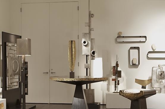 Alain Douillard exhibition at Magen H Gallery, installation view showing &quot;Miroir aux alouettes&quot; sculptural screen, floor lamp, round table, &quot;Totem&quot;, &quot;Coffrets&quot; sculpture, chair and set of shelves