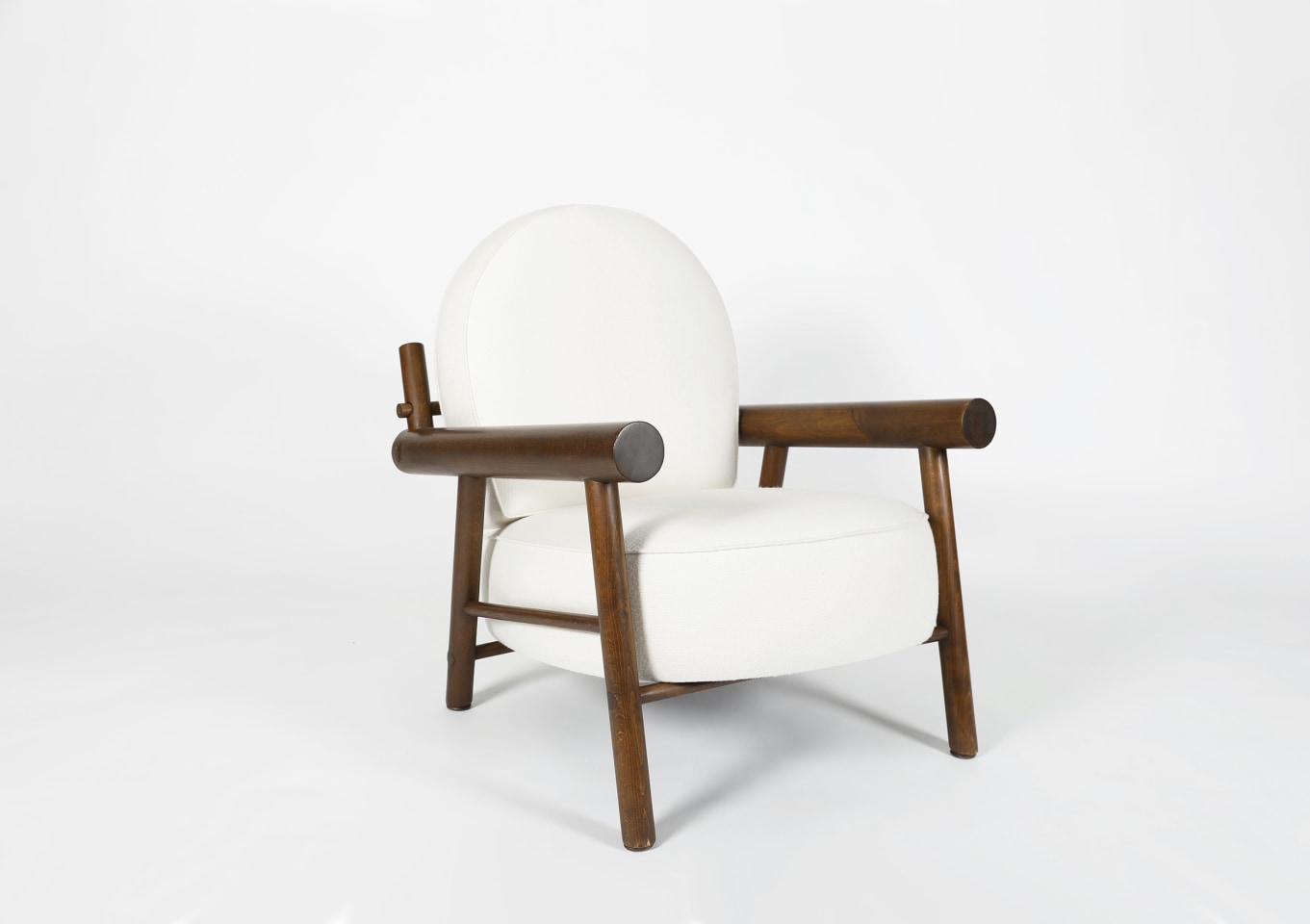 Attributed to Charlotte Perriand, pair of armchairs, single chair diagonal view