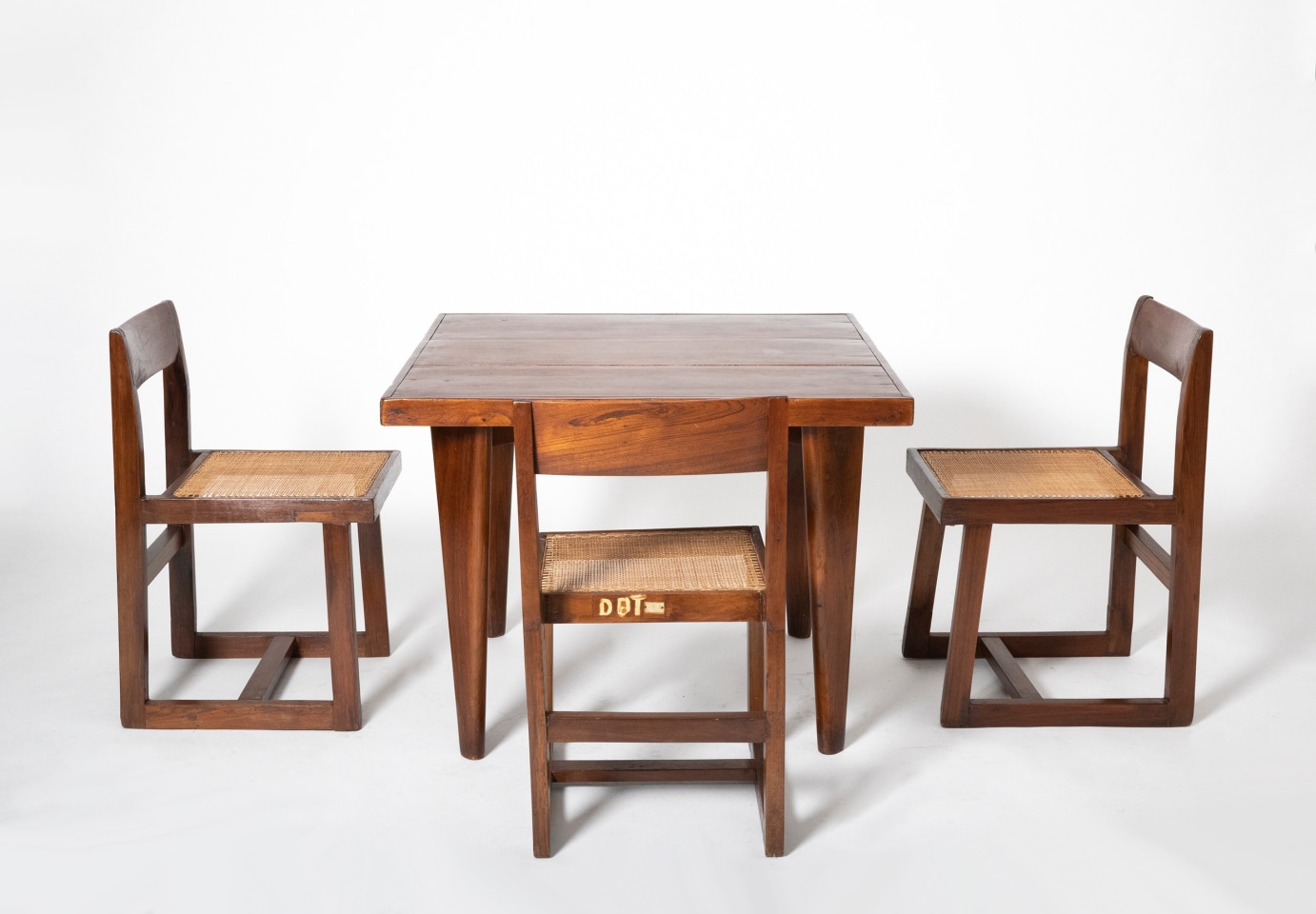 Pierre Jeanneret's square table shown with set of 4 Jeanneret chairs