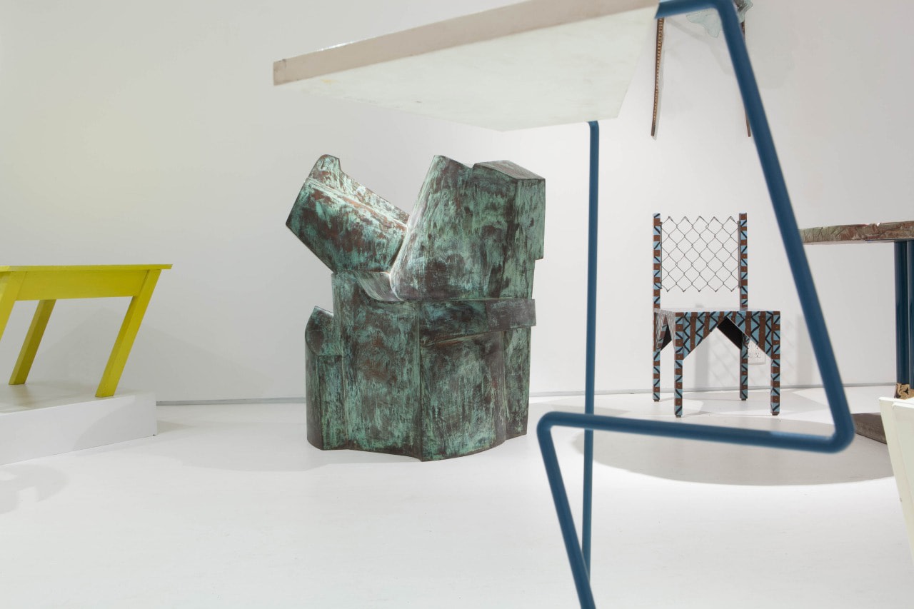 Art et Industrie exhibition installation view: Pieces from left to right are Rafael Barrios' Mesa table, Jim Cole's Dorset Marker, and Paul Ludick's Apartheid Chair