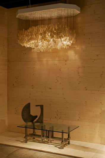 Magen H Gallery's booth at Design Miami/Basel, install view showing a French 1960s Mother of pearl pendant, Marino di Teana's sculptural coffee table and &quot;Dialogue Forme Espace Edition&quot; sculpture