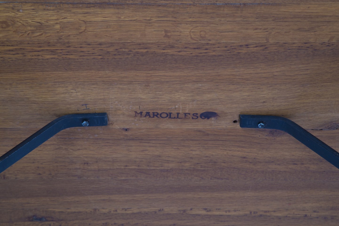 Marolles' dining table detailed view of signature underneath table top