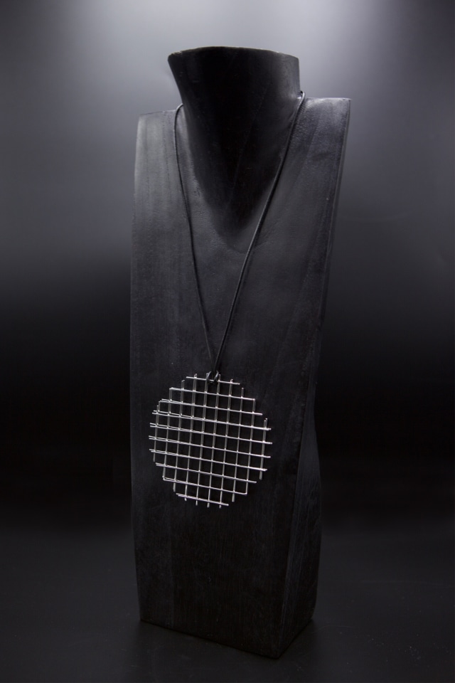 François Morellet's &quot;Trame Disques quadrillés argentés&quot; necklace, diagonal view