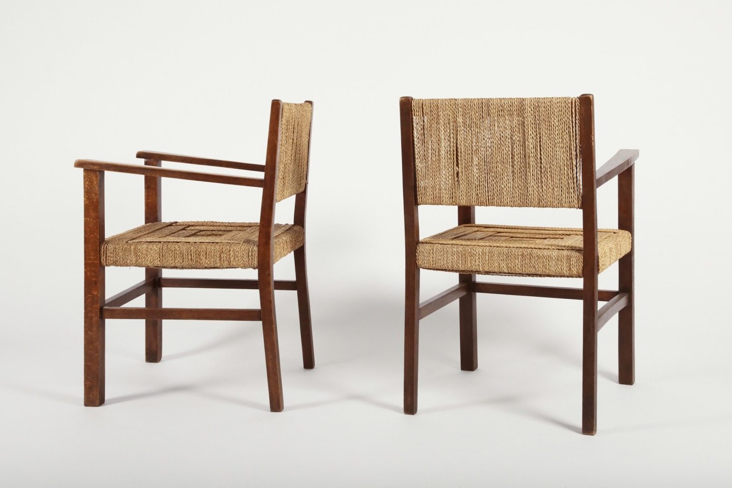 Francis Jourdain (1876 - 1958) Pair of armchairs, 1930_View of both chairs. One facing perpendicular to the other