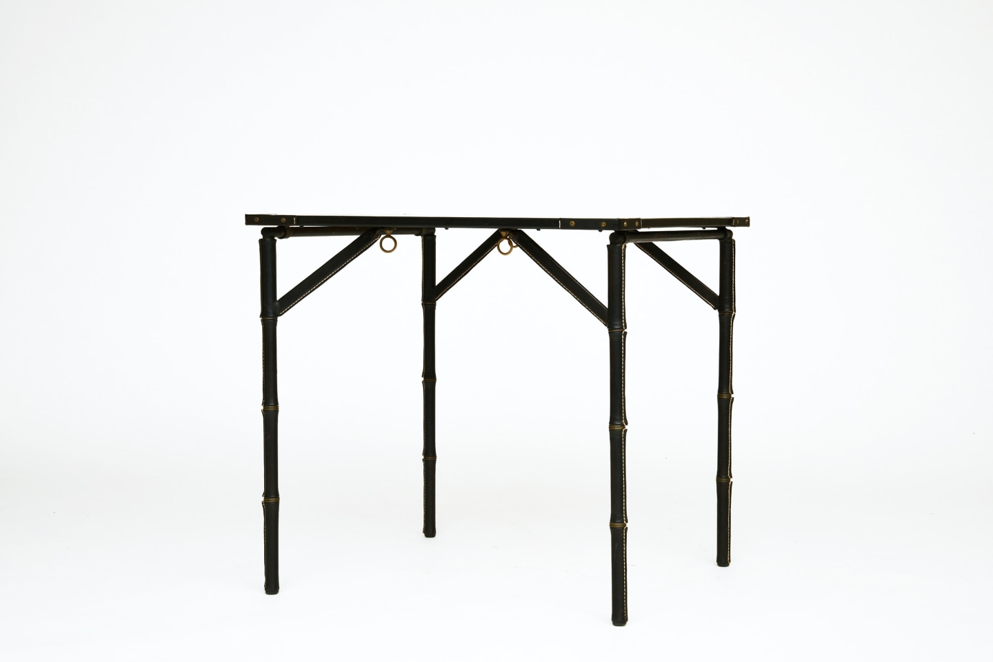 Jacques Adnet's table, diagonal view from eye-level