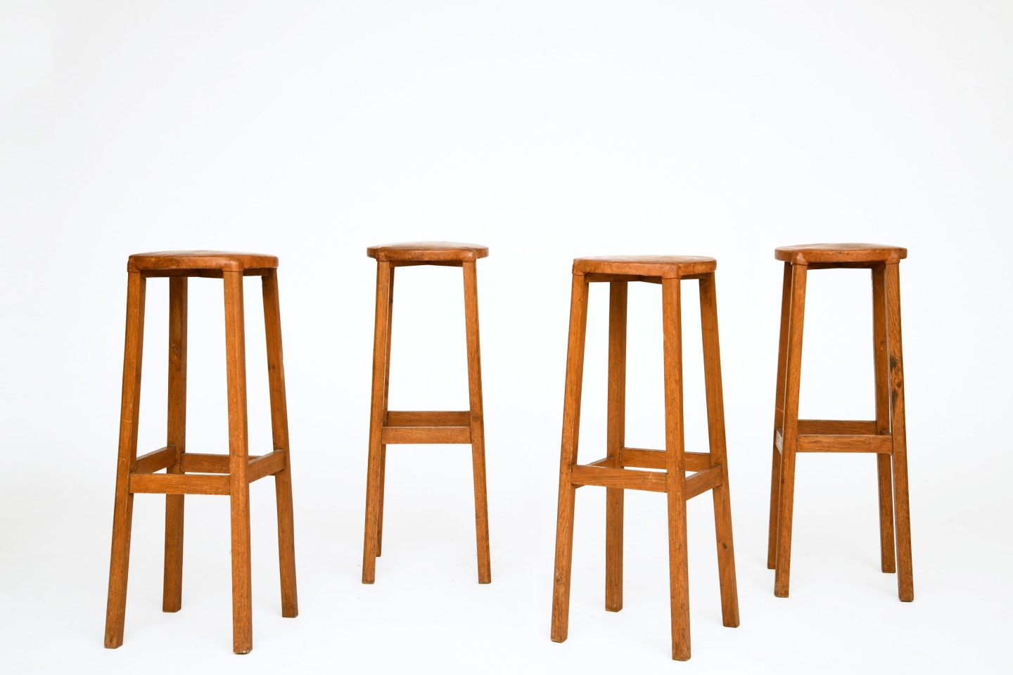 Unknown Artist's set of 4 stools, staggered view of all stools, some turned