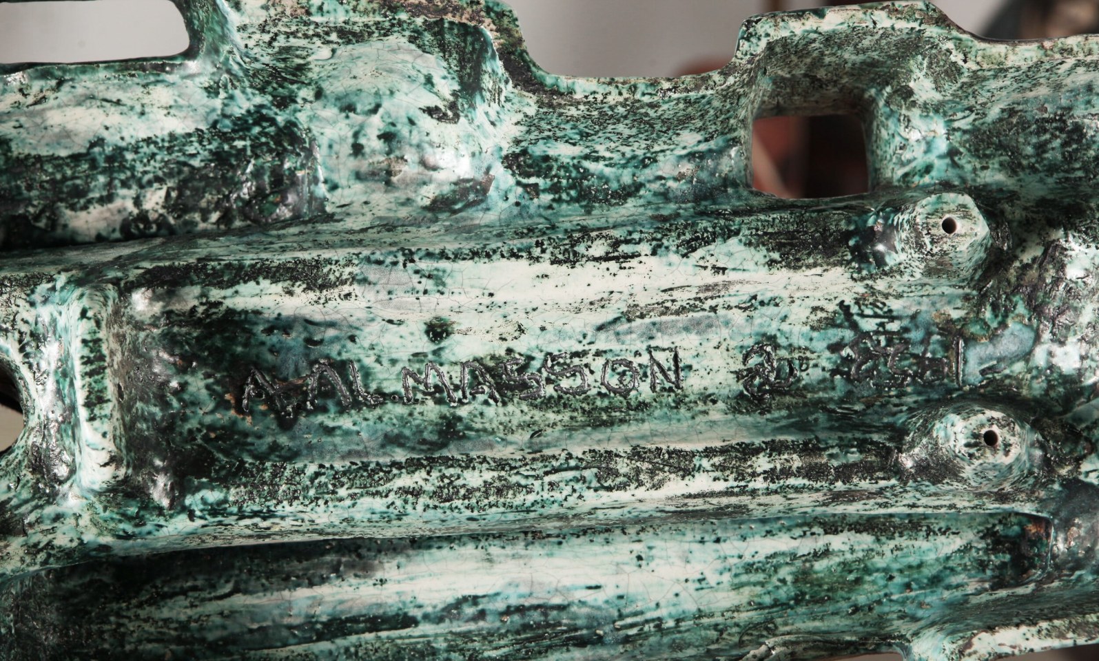 Andre-Aleth Masson's ceramic wall sculpture detailed view of signature on back