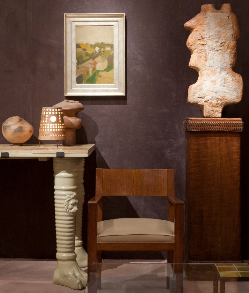 Magen H Gallery's booth at Winter Antiques Show, install image Elisabeth Joulia's ceramic sculpture, Yves Mohy's table lam[, Elisabeth Joulia's large vase, Jean Royere's chair, Jean et Jaqueline Lerat's ceramic