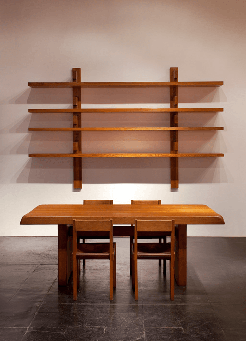 Magen H Gallery's booth at Collective Design Fair, showcasing Pierre Chapo's B17 Longue bookshelf, &quot;T14C&quot; dining table and a set of &quot;S24B&quot;chairs