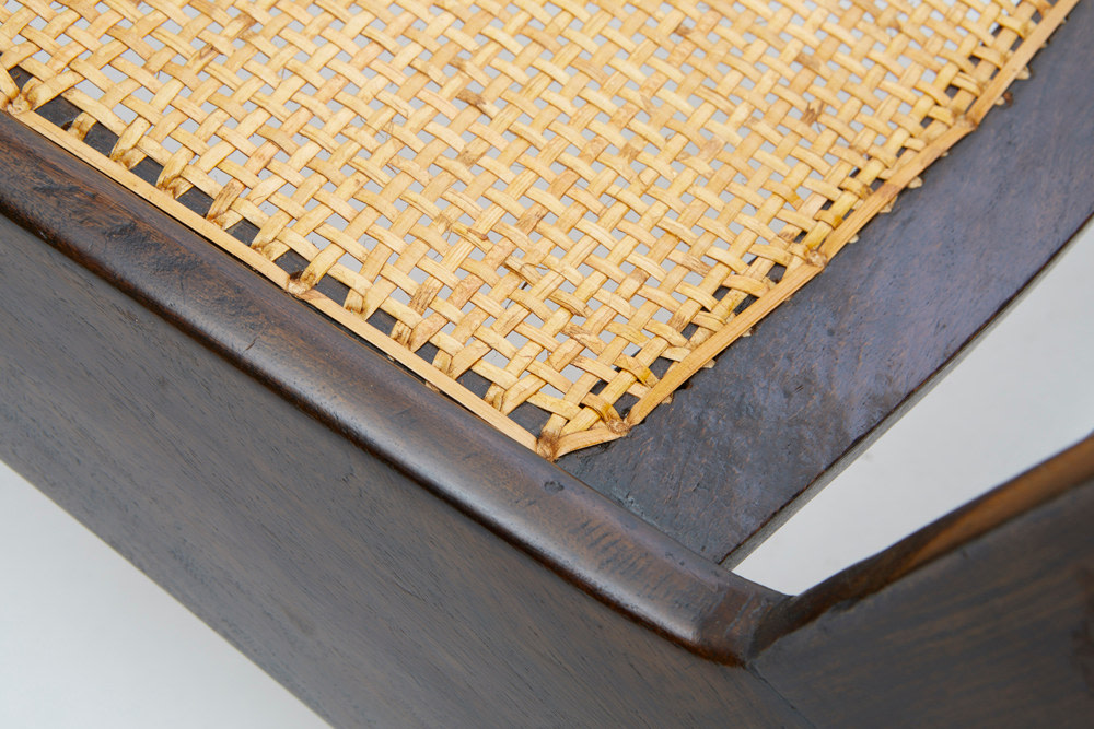 Pierre Jeanneret's pair of kangourou chairs detailed view of caning and wooden frame