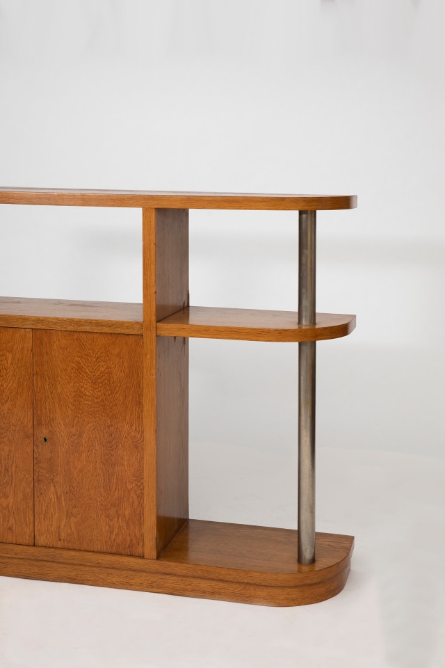 Jean Roy&egrave;re's bookshelf, cropped view of the side