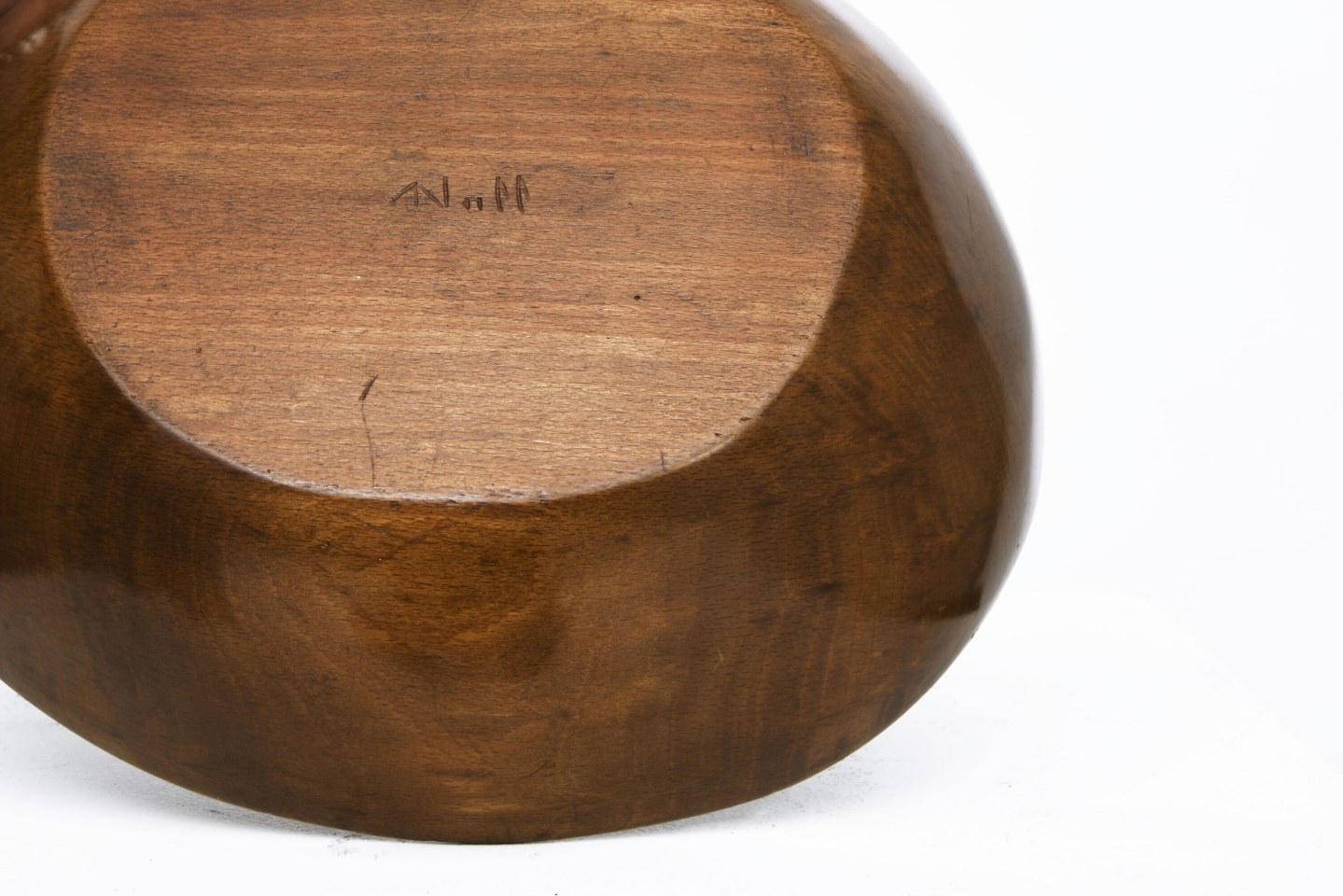 Alexandre Noll's wooden bowl, view of signature underneath